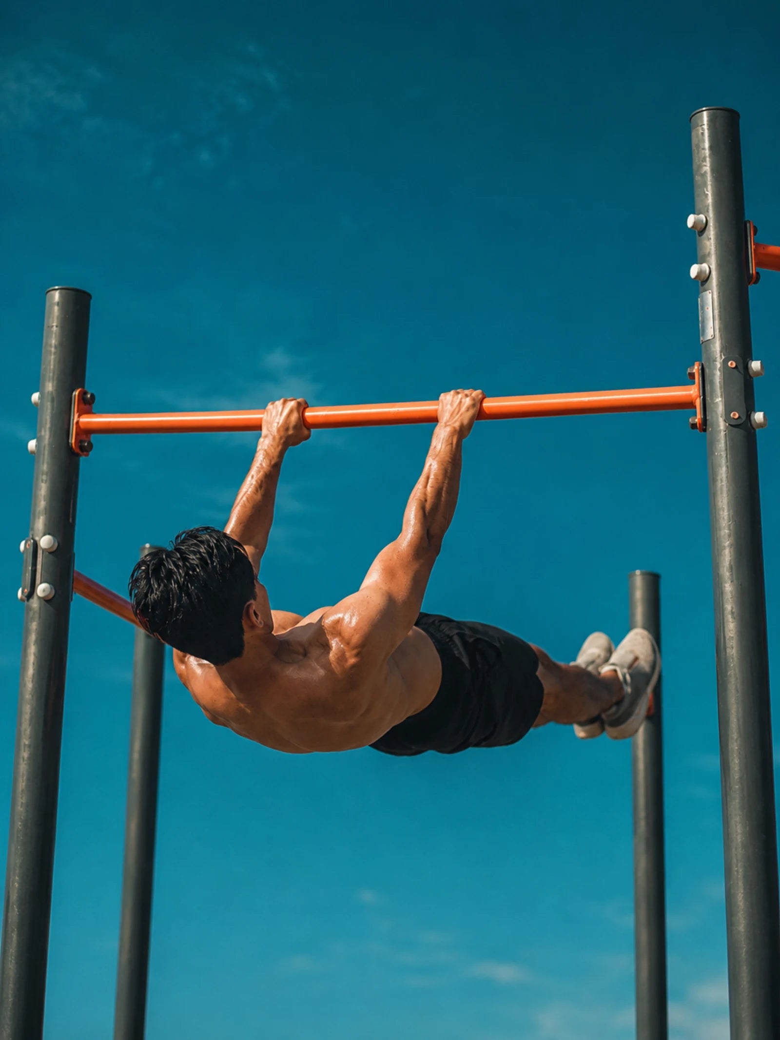 An athlete performing a front lever hold